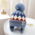 Bonnet à pompon et cache-oreilles – Bleu à motifs