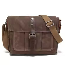 Sac bandoulière unisexe vintage en toile porté épaule