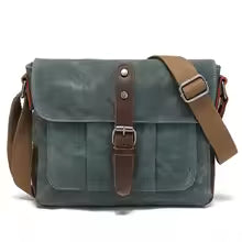 Sac bandoulière unisexe vintage en toile porté épaule
